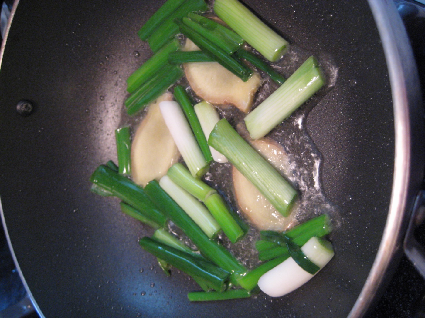 saute ginger and green onions